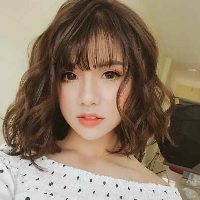 Kiểu tóc ngắn ngang vai uốn gợn sóng